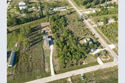 1180 County Road 5023, Cleveland, TX 77327 - Photo 1