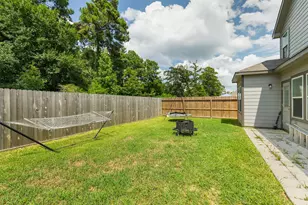 12990 Sorrento Bay Dr, Willis, TX 77318 - Photo 26