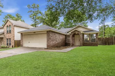 14104 Running Bear Drive, Willis, TX 77378 - Photo 1