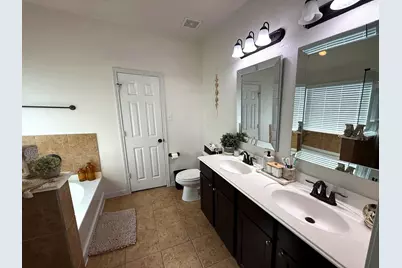 10122 Mariposa Stream Court, Houston, TX 77044 - Photo 12