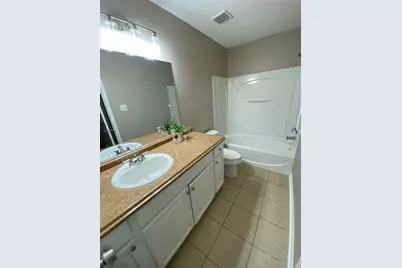 8825 E Buffalo Circle, Willis, TX 77378 - Photo 12