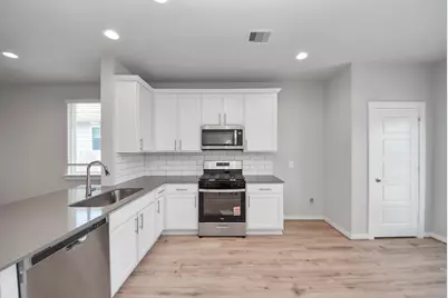 12527 Colchester Creek Court, Houston, TX 77047 - Photo 14