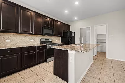 13211 Barrington Oaks Circle, Houston, TX 77044 - Photo 6