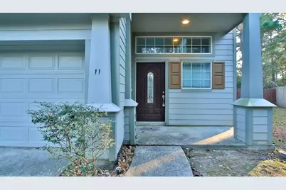 11 Aquiline Oaks Place, The Woodlands, TX 77382 - Photo 4
