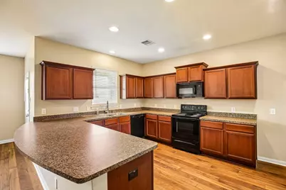 10777 S Lake Mist Lane, Willis, TX 77318 - Photo 12