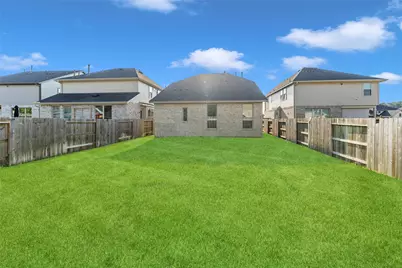 1426 Northwood Bluff Lane, Pinehurst, TX 77362 - Photo 4