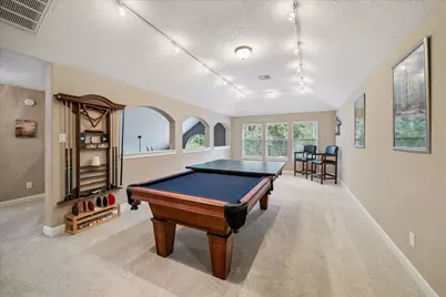 2621 Tranquil Oaks Court, Kingwood, TX 77345 - Photo 18