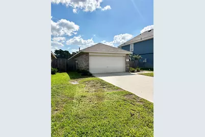 709 Roaring Falls Drive, Willis, TX 77378 - Photo 2
