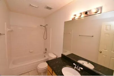 9007 Woodleigh Drive, Houston, TX 77083 - Photo 18