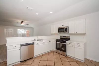 4707 Markham Woods Court, Houston, TX 77345 - Photo 12