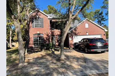 26864 Calgary Pointe Drive, Kingwood, TX 77339 - Photo 1