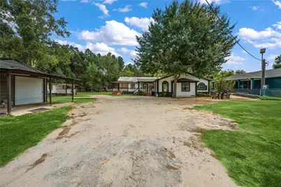669 County Road 3408, Cleveland, TX 77327 - Photo 1