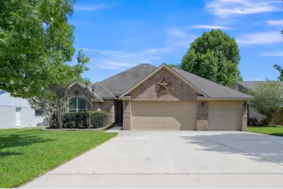 9766 Twin Shores Drive, Willis, TX 77318 - Photo 1