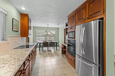 15749 Lakeway Drive, Willis, TX 77318 - Photo 14