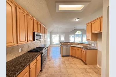 7411 Maple Run Drive, Sugar Land, TX 77479 - Photo 12