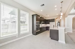 13915 Foyt Dr, Mont Belvieu, TX 77523 - Photo 16