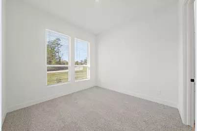 328 Louvenia Court, Pinehurst, TX 77362 - Photo 18