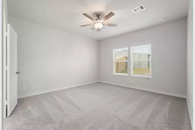 11962 Wisteria Meadows Drive, Willis, TX 77318 - Photo 12