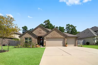 725 Ivory Creek Court, Willis, TX 77378 - Photo 2