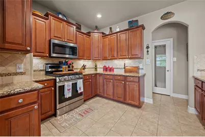 9723 Suffolk Downs Drive, Mont Belvieu, TX 77523 - Photo 30