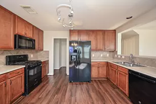 9403 Coatsworth Dr, Sugar Land, TX 77498 - Photo 12