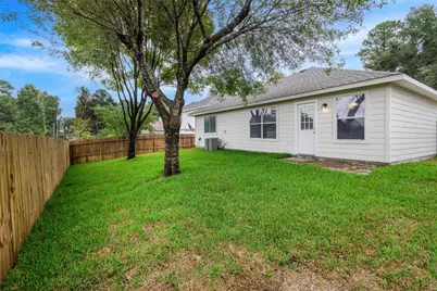 14099 Running Bear Drive, Willis, TX 77378 - Photo 32