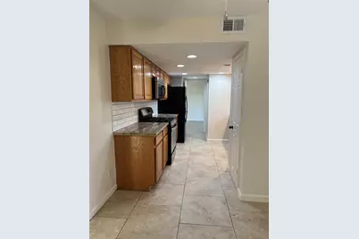 4322 Woodmont Drive, Houston, TX 77045 - Photo 8