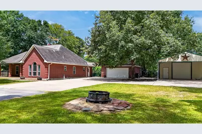 822 Sentinel Oaks, Pinehurst, TX 77362 - Photo 2