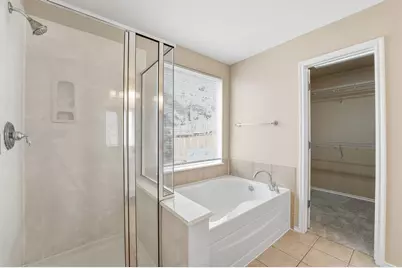 4706 Woodspring Glen Lane, Houston, TX 77345 - Photo 10