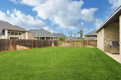 1329 Knollbridge Point Lane, Pinehurst, TX 77362 - Photo 32