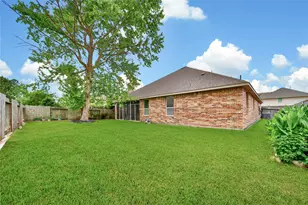 911 River Crossing Dr, Conroe, TX 77384 - Photo 32