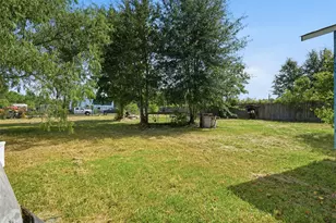 910 County Road 3556, Cleveland, TX 77327 - Photo 18