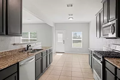 7722 Boulder Sunstone Lane, Conroe, TX 77304 - Photo 14