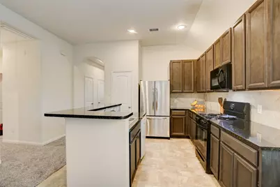 6535 Blimp Base Road, Hitchcock, TX 77563 - Photo 8