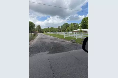 1166 County Road 3663, Splendora, TX 77372 - Photo 1