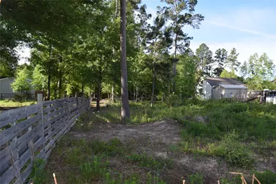 893 County Road 5015, Cleveland, TX 77327 - Photo 2
