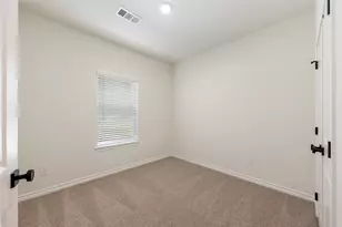 313 N Woodson St, Willis, TX 77378 - Photo 16
