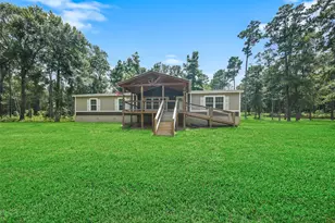 577 Winding River Rd, Oakhurst, TX 77364 - Photo 1