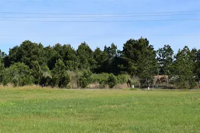 1129 County Road 5100, Cleveland, TX 77327 - Photo 6