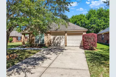 26920 Carriage Manor Lane, Kingwood, TX 77339 - Photo 1