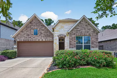 135 Winged Elm Court, Willis, TX 77318 - Photo 1