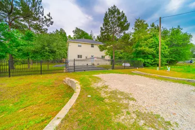 141 County Road 3419, Cleveland, TX 77327 - Photo 32