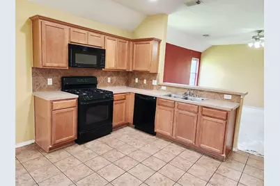 9803 Wedgeford Court, Houston, TX 77044 - Photo 18