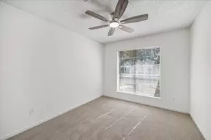 143 W Village Knoll Cir, The Woodlands, TX 77381 - Photo 14