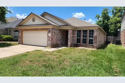 12311 Carriage Oak Circle, Humble, TX 77346 - Photo 1