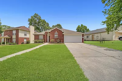 7063 Gentle Breeze Drive, Willis, TX 77318 - Photo 2