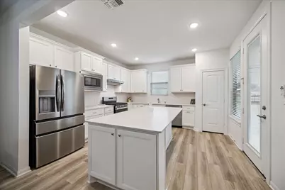 9911 Monarch Landing Cove, Willis, TX 77318 - Photo 6