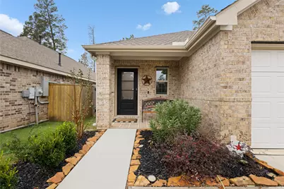 10417 Pineland Drive, Willis, TX 77378 - Photo 1