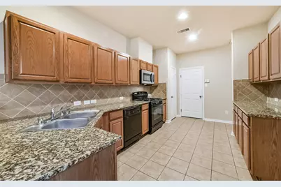 12947 Iris Garden Lane, Houston, TX 77044 - Photo 16