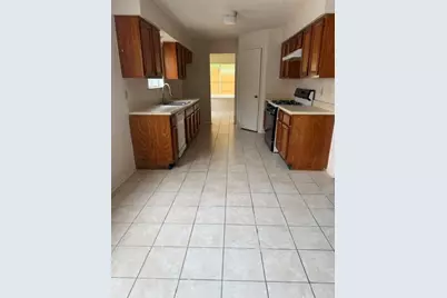 11323 Mulholland Dr, Stafford, TX 77477 - Photo 6